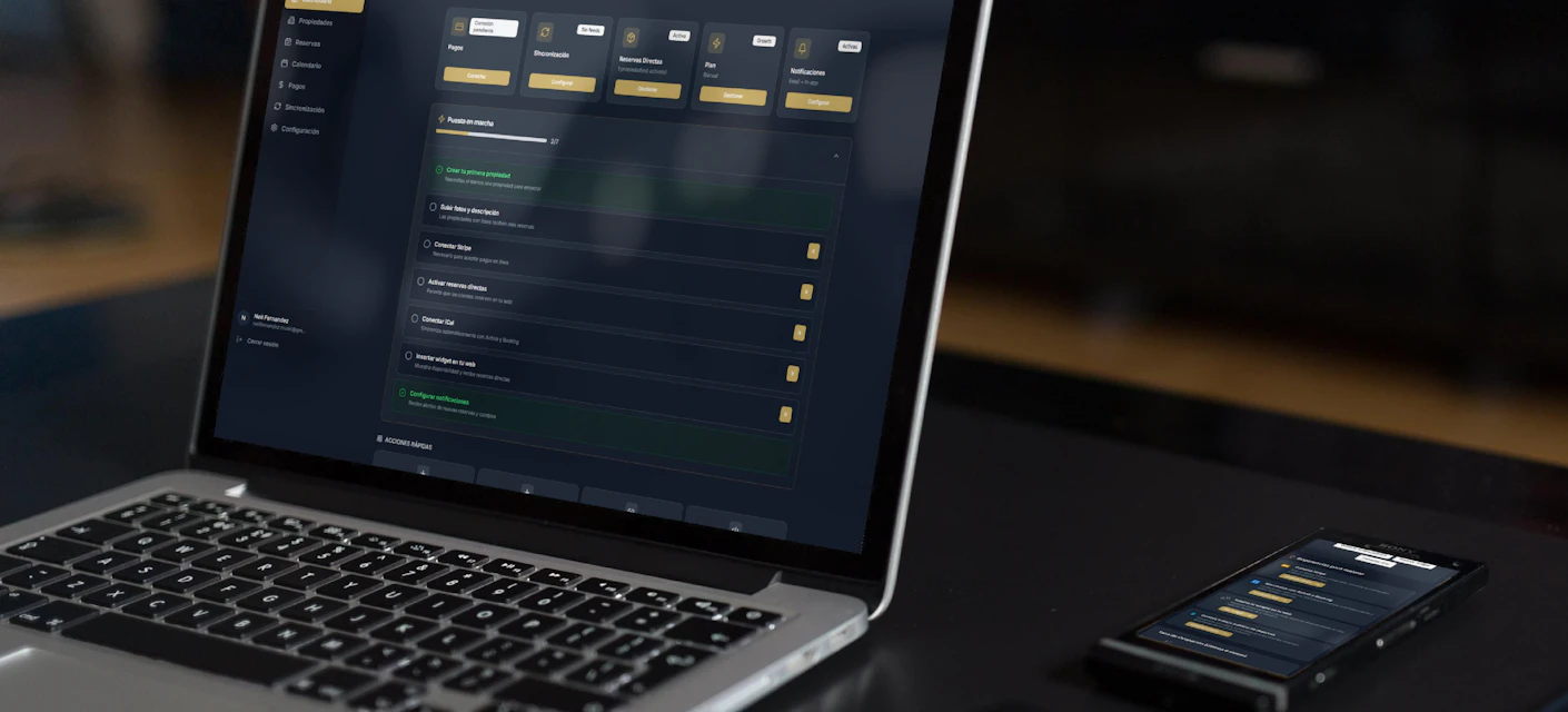 Laptop and phone displaying a finance dashboard