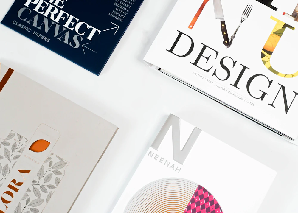 Design books and paper samples for typography inspiration