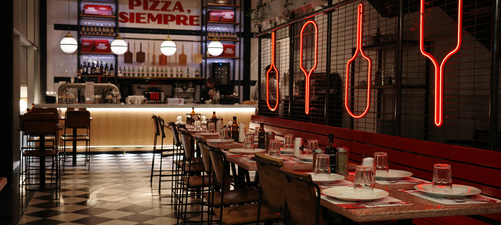 Modern restaurant interior with neon signs