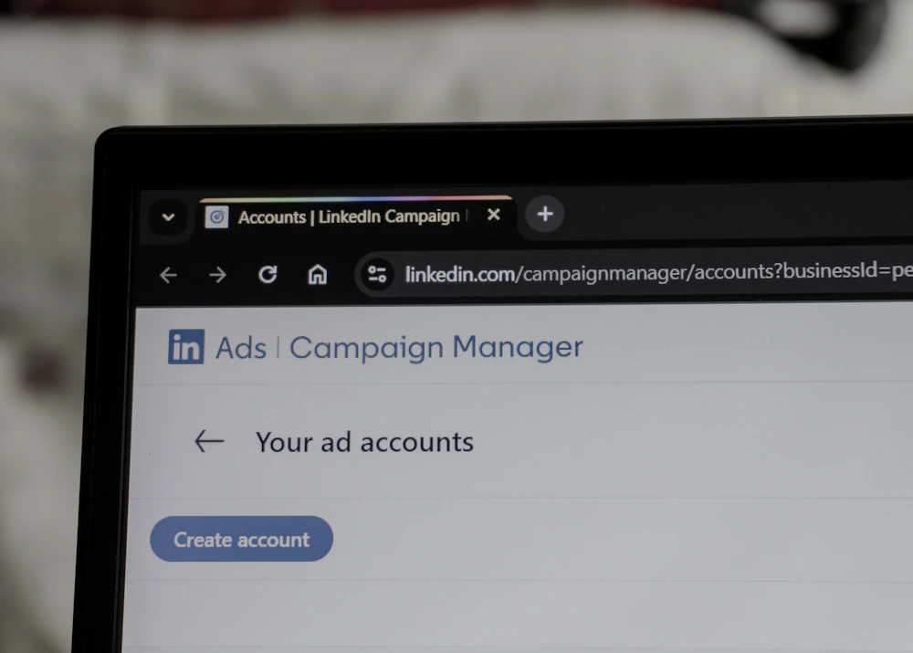 LinkedIn Ads Campaign Manager open on a laptop screen